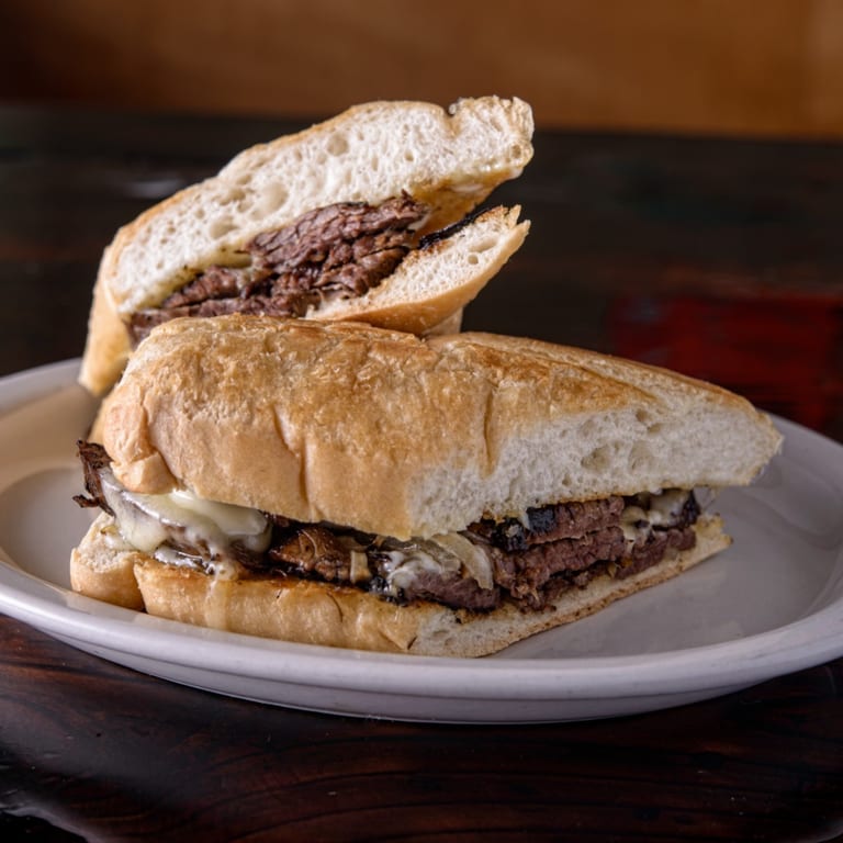 Indulge in Our Cheesesteak